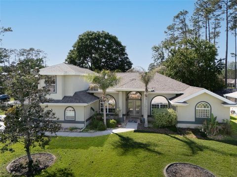 Photo of 40 Edgewater Drive, Palm Coast, FL 32164 (MLS # FC317640)