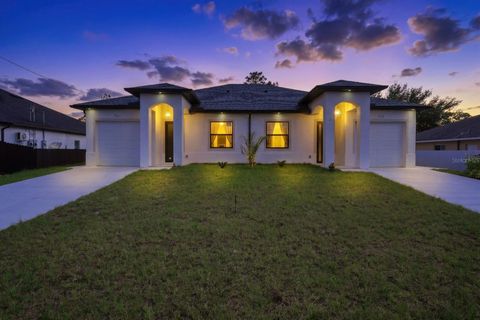 Photo of 521 Lillon Avenue S, Lehigh Acres, FL 33974 (MLS # TB8489524)