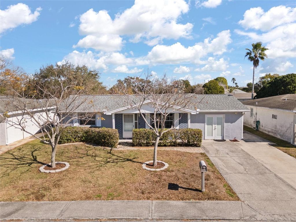 Photo of 10010 Brunswick Lane, Port Richey, FL 34668 (MLS # TB8470666)