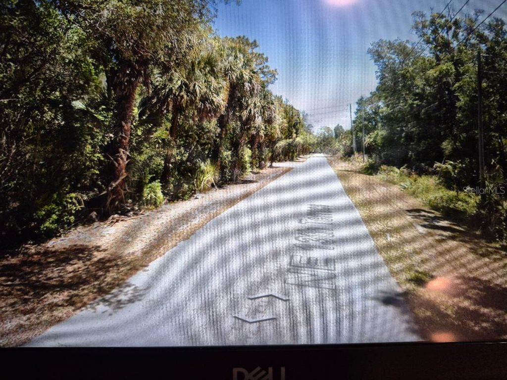 Photo of 558 NE 13th Terrace, Crystal River, FL 34428 (MLS # TB8385033)