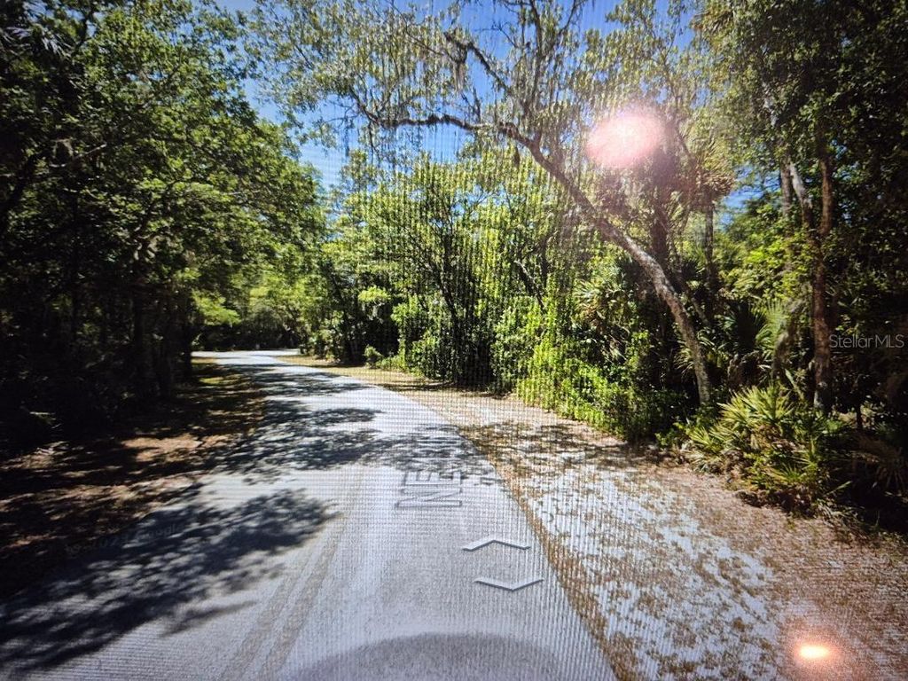 Photo of 558 NE 13th Terrace, Crystal River, FL 34428 (MLS # TB8385033)