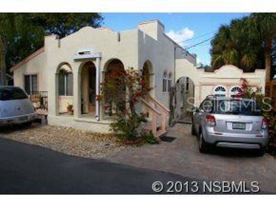 REDUCED AGAIN ($45k total) on North Beach's Popular Eclectic Esther St, just 200 yards to Famous Flagler Ave and short walk to NSB's newest Beachfront Park and the river comes this Historical Spanish Mission Home wonderfully updated while keeping with period archways, original built-ins, high ceilings, including vaults, terracotta and heart-of-pine hardwood floors. Gorgeous original fireplace updated to remote gas logs. Main central air/heat home has large family room,formal dining room, eat-in kitchen, master bedroom with ensuite bath and W/I closet, guest bedroom and 2nd full guest bath with frameless glass shower. Guest house or office can be used as a 3rd BR with laundry room that can easily be converted into a 3rd bath with closet. Updates also include newer windows, cable/internet, fiberglass french doors, recessed lighting, wainscoting, painting, additional deck/porch, storage for beach gear and bikes, paver driveway, outdoor shower and so much more. This home is full of charm that is the essence of the NSB lifestyle. Do not miss out in this one-of-a-kind home in NO FLOOD ZONE on one of the best streets on the beachside. ALL FURNISHINGS ARE AVAILABLE AND NEGOTIABLE WITH ALL OFFERS. ;Water: City