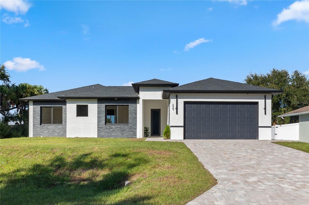 Photo of 229 Ferdon Circle, Port Charlotte, FL 33954 (MLS # C7532309)