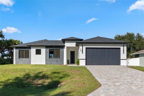 Photo of 229 Ferdon Circle, Port Charlotte, FL 33954 (MLS # C7532309)