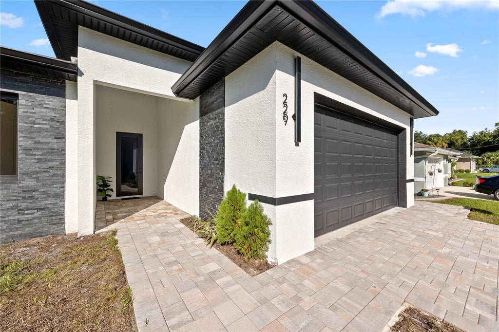 Photo of 229 Ferdon Circle, Port Charlotte, FL 33954 (MLS # C7532309)