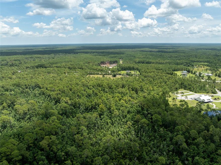 Discover the perfect blend of privacy, beauty, and potential with this 2.5-acre unimproved lot, fully wooded and zoned Resource Corridor—a designation that protects the natural landscape while allowing for thoughtfully planned, low-impact use. Located near Prevatt Ave and the Volusia County Fairgrounds.  Buyers should check with the county zoning department to determine if this property can be used for their intended use.