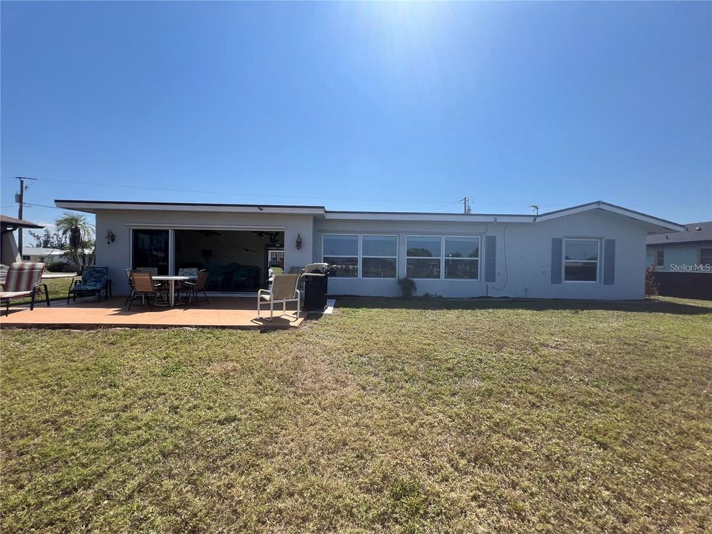 Photo of 758 Spring Lake Boulevard NW, Port Charlotte, FL 33952 (MLS # A4684665)