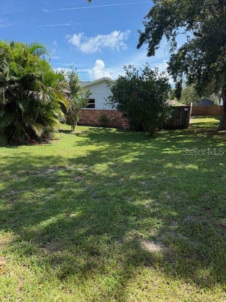 "Open the Doors to Your Dreams" of owning a very nice home with a Spacious Kitchen with lots of cabinets. This home features a screened front porch and a Screened back porch / LANAI. This is a very clean and well maintained home. Great for first time homebuyers. This property may qualify for Seller Financing (Vendee). If property was built prior to 1978, Lead Based Paint Potentially Exists. The home features
Kitchen Island with Granite Countertop. Open Floor Plan with a spacious UPDATED KITCHEN WITH UPGRADED CABINETS AND GRANITE COUNTER TOPS; BOTH BATHROOM UPGRADED WITH MODERN BATHROOM FEATURES.  You will love the layout and the Good Condition of this home. Just Reduced. At this "low price" this house not last long on the market. Come see it today!
NEW ROOF WAS INSTALLED APRIL 12, 2022.
