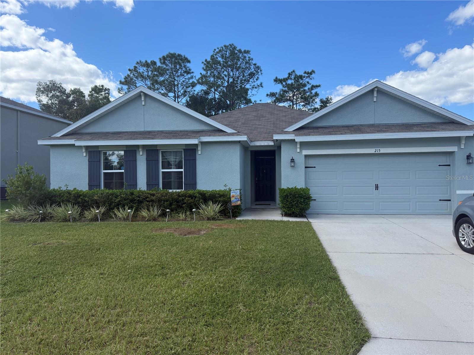 Experience the ease of one-story living in the Denton, available in Lake Diamond, in Ocala, Florida.
This open-concept, four bedroom, and two bathroom home has a seamlessly designed layout that connects the living, dining, and kitchen areas into a central space creating a open and inviting atmosphere.
The kitchen features a large kitchen island with quartz countertops overlooking the great room. Your full stainless-steel appliance package includes a refrigerator, microwave, range, and built-in dishwasher.
Located in the rear of the home is the primary bedroom with an ensuite bathroom featuring a double vanity, quartz countertops, large walk-in closets and ample storage space. 3 more bedrooms are conveniently located in the front of the home and share a large second bathroom with a double vanity and quartz countertops. Each bedroom has carpeted floors and a closet. The dedicated laundry room comes complete with a washer and dryer.
This home is the perfect blend of simplicity, convenience, and style. Like all homes in Lake Diamond, the Denton is complete with a state-of-the-art smart home system that keeps you connected to your home at all times, whether you're 5-minutes or a plane ride away. It also has solar panels that are negotiable.