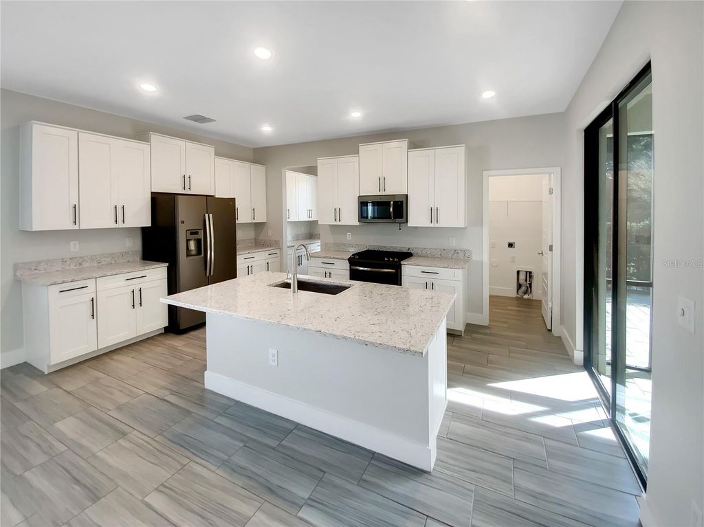 Photo of 17335 Brighton Lake Road, Land O Lakes, FL 34638 (MLS # TB8454363)