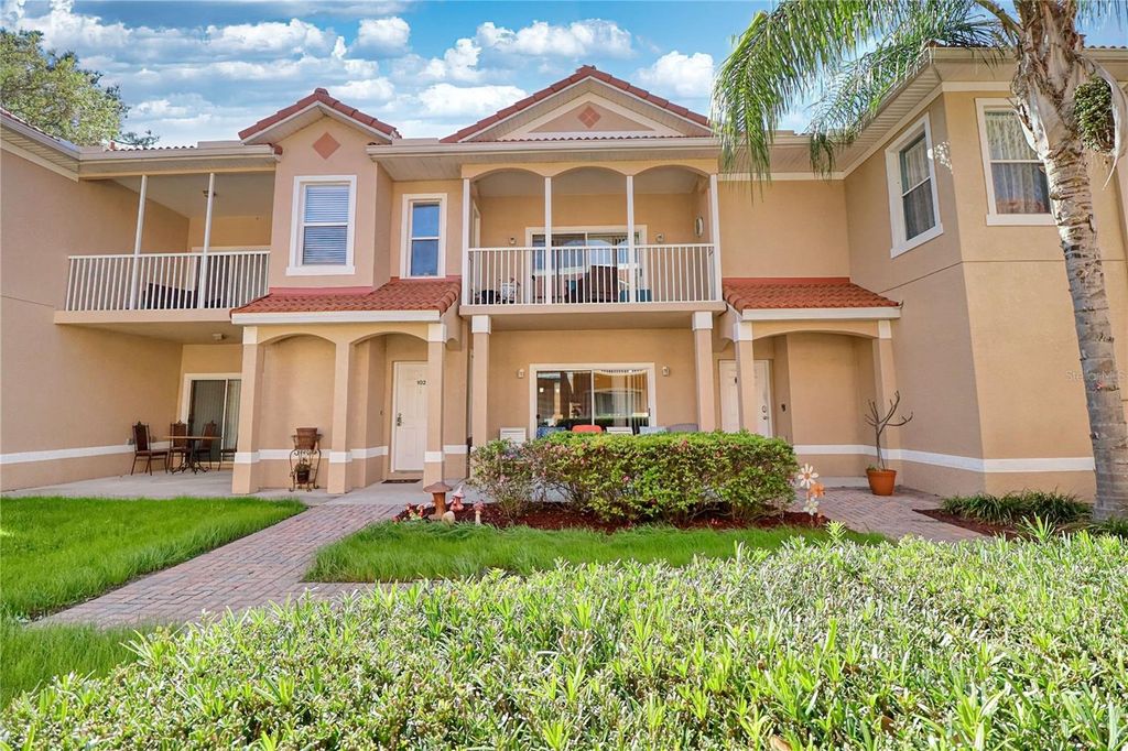 Photo of 21020 Sunpoint Way #102, Lutz, FL 33558 (MLS # A4686883)