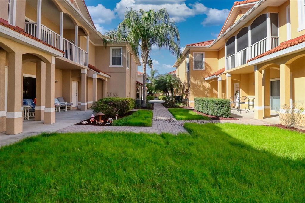 Photo of 21020 Sunpoint Way #102, Lutz, FL 33558 (MLS # A4686883)