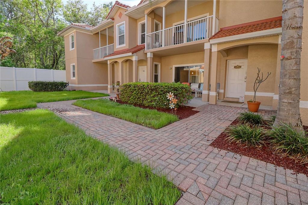 Photo of 21020 Sunpoint Way #102, Lutz, FL 33558 (MLS # A4686883)