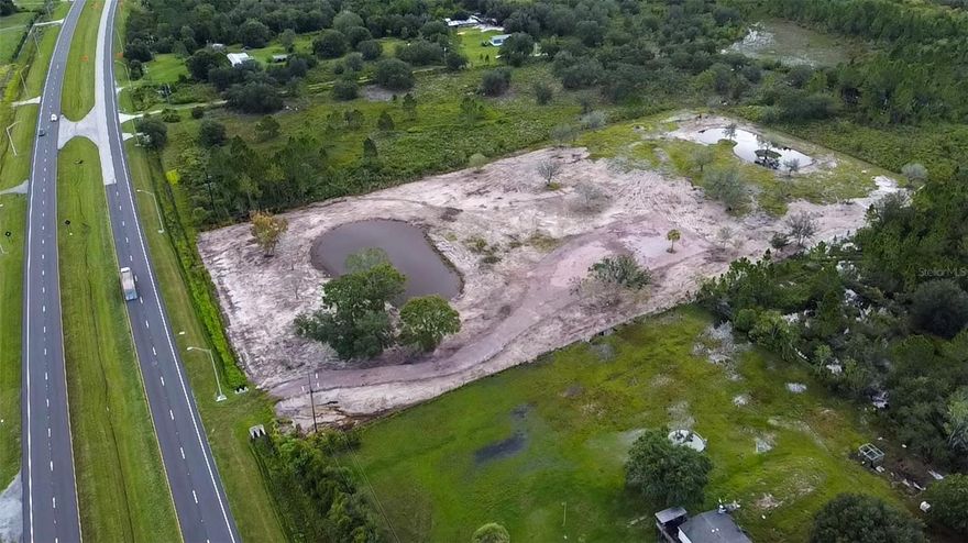 5.14 Acres CLEARED!!! with 2 Ponds – Ready to Build!
Don’t miss this rare opportunity to own 5.14 acres of fully cleared land off Hwy 60. This beautiful property features two private ponds, partial fencing, and a clay road already paved for easy access. With its prime location right off a busy road, you’ll enjoy both visibility and convenience, while still having the space and privacy to create your perfect retreat. Whether you’re dreaming of building your custom home, starting a hobby farm, or developing your own oasis, this property offers endless possibilities. Utilities nearby and land ready for your vision – bring your plans and make it happen!