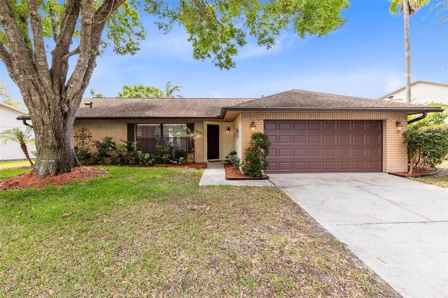 Nestled in the desirable Alafaya Woods community of Oviedo, this charming 3-bedroom, 2-bathroom home offers the perfect blend of comfort, functionality, and thoughtful updates. Inside, you’ll find an open floor plan with a seamless flow between the living spaces, creating an inviting atmosphere ideal for both everyday living and entertaining. The updated kitchen features granite countertops, newer appliances, and ample space for gathering, while granite surfaces in both bathrooms add a polished touch throughout the home. Natural flow and layout make every space feel connected and comfortable. Step outside to enjoy the large screened-in porch overlooking a fully fenced backyard, providing the perfect space for relaxing, entertaining, or enjoying the Florida lifestyle year-round. Additional highlights include an indoor laundry room and major system updates already completed for peace of mind, including a 2019 roof, 2020 hot water heater, and 2018 HVAC system. Conveniently located near parks, shopping, dining, and top-rated schools, this well-maintained home is ready for its next owner to enjoy.