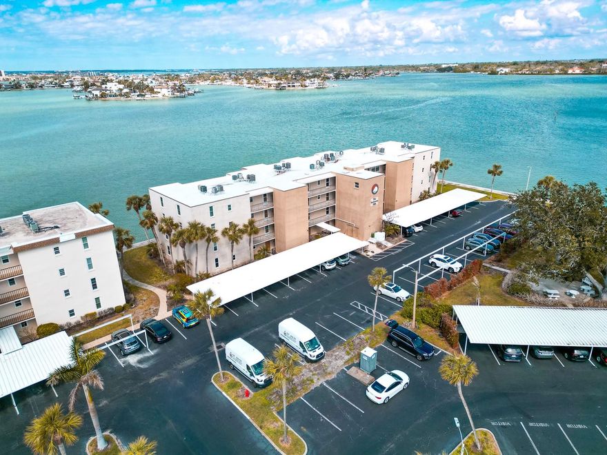 Welcome to your updated waterfront corner unit in the highly sought-after Bay Island, a 55+ gated community in South Pasadena. Located in the Yorktown building, this renovated two-bedroom, two-bath residence features luxury vinyl flooring, a sleek modern kitchen with quartz countertops, and beautifully updated bathrooms throughout. Bright, open living spaces are enhanced by additional corner-unit windows, filling the home with natural light and capturing sweeping water views of Boca Ciega Bay from your private screened balcony. The spacious primary suite offers a peaceful retreat, while the light-filled guest room provides comfort and flexibility for visitors or a home office. Hurricane-impact windows and sliders add peace of mind and energy efficiency, and an in-unit laundry closet adds everyday convenience. One small dog or cat may be considered at the landlord’s discretion with association approval. Enjoy resort-style living with Bay Island’s exceptional amenities, including multiple pools, tennis and pickleball courts, fitness centers, and a scenic waterfront walking path—all just five minutes to famous St. Pete Beach and 15 minutes to vibrant downtown St. Pete, with dining and shopping nearby. Available for long-term rental at this rate.