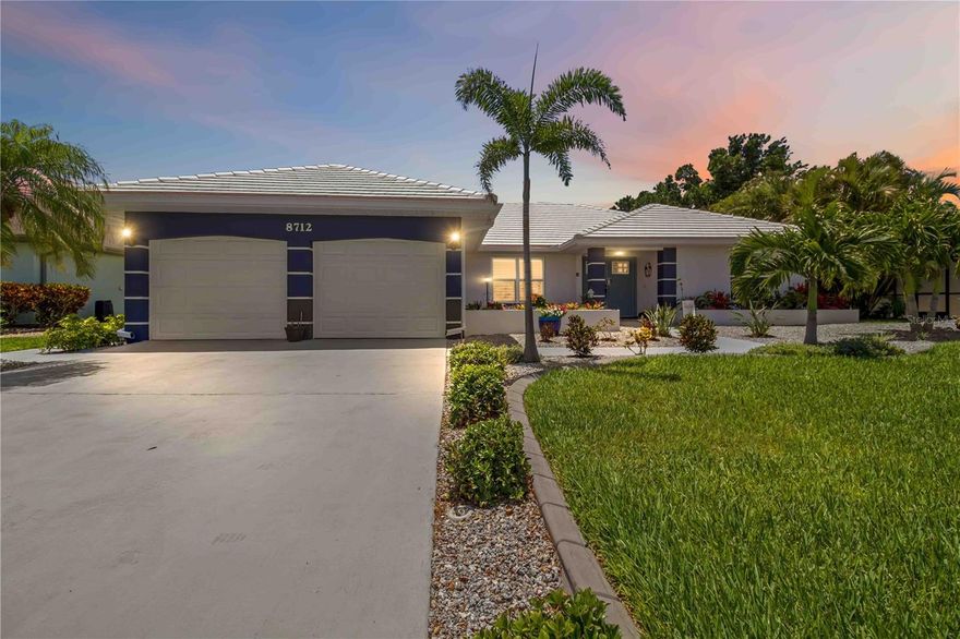 Welcome to this beautiful Bay Lakes Estates home—where every detail has already been handled.

This fully remodeled 3-bedroom, 3-bathroom, 2-car garage home is the definition of move-in ready… without a single compromise. No stone has been left unturned, every surface has been thoughtfully updated, from the flooring and bathrooms to the fresh, modern interior and exterior paint. The level of care, cleanliness, and attention to detail is immediately evident the moment you arrive.

From the moment you walk through the door, your eye is drawn straight through the expansive impact sliders to a stunning outdoor scene—your private heated pool and spa overlooking a serene pond with a tranquil water feature. It’s the kind of view that instantly slows your pace.

Inside, vaulted ceilings and a cohesive, designer-inspired color palette create an elevated yet comfortable living space. The heart of the home is a show-stopping 19’3” kitchen peninsula, wrapped in elegant Bianco Cielo quartz, complemented by shaker cabinetry and Samsung appliances (2022)—perfect for entertaining or everyday luxury.

And then there’s the peace of mind, because the big-ticket items? Already done.

* New ductwork & variable speed HVAC (2024)
* Seawall replacement (2025, $73K) + enhanced waterfront landscaping
* Pool cage with full-view screen (2023, $29.5K), heated pool + spa, new pump (2026)
* Impact windows & sliders (2021)
* Luxury vinyl plank flooring throughout (2026, $20K)
* Tile roof replaced (2013), professionally pressure washed (04/2026), and upgraded with hurricane clips (03/2026)
* Exterior was painted, along with driveway & pool deck  (2026)

Even the neighborhood delivers—buried utilities (hello storm season peace of mind), plus HOA-covered lawn care, irrigation, and pond maintenance.

And when you’re ready to leave your private oasis? You’re just 3 miles from the sugar sand beaches of Anna Maria Island and Bradenton Beach.

This isn’t just updated, it’s complete.
All that’s left is for you to move in and start living.
Please check out the Matterport 3D walk through.