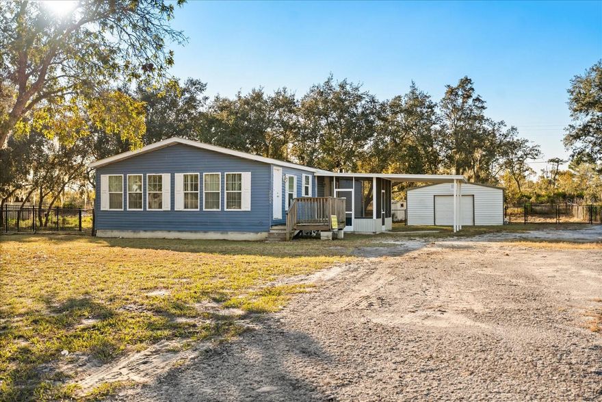Discover comfortable country living in this spacious 1,566 sq. ft. manufactured home, perfectly situated on a ½-acre lot just minutes from beautiful Lake Walk-In-Water in Lake Wales, FL. This inviting property features an open floor plan with a bright living and dining combo and a separate large family room ideal for entertaining or creating your own cozy retreat. The kitchen offers ample workspace and comes equipped with a brand-new refrigerator and range. Easy care laminate and tile flooring runs throughout the home, providing both durability and style. The generous master suite has a private bath with dual sink vanity and walk-in shower. Outside, you’ll find a detached garage and workshop, offering plenty of room for vehicles, hobbies, storage, or outdoor projects. With its generous lot size, there’s space to garden, park your toys, or simply enjoy the peaceful surroundings. Whether you’re looking for a full-time residence or a weekend getaway near one of Central Florida’s cherished fishing and recreational lakes, this property is must-see and move-in ready! All information recorded in the MLS is intended to be accurate but cannot be guaranteed, buyer advised to verify. Sold As-Is.”