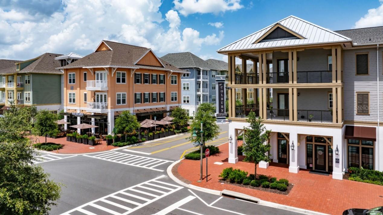 The all-new Colburn Apartment homes feature two home design scheme options; energy-efficient, stainless steel appliances; custom cabinetry with under-cabinet lighting and designer hardware; granite countertops; French-door refrigerators with water/ice dispensers; deep-soaking, garden-style bathtubs; expansive kitchen islands with pantry storage; designer kitchen tile backsplashes; undermount sinks with gooseneck faucets; designer kitchen pendant lighting; wood-style flooring; integrated Sonos® sound systems; keyless home entry systems; 10-foot ceilings; built-in desks; spacious walk-in closets; walk-in, glass-door showers with rainfall showerheads *; double-sink vanities *; bedroom ceiling fans and private patios and balconies. *Only available in select homes.
The Colburn amenities include a resort-style pool, outdoor resident lounge, resident clubhouse with a European pantry and tea room, lakeside walking trails, resident maker’s studio, fitness center with yoga/spin studios, adventure playground, bike storage and repair room, planned resident social events, additional outdoor storage available, 24/7 package lockers, access to all celebration amenities, level 1 EV charging stations *, 1st floor retail, dog grooming spa, private conference room, bike storage and repair room, pet-friendly community, planned resident social events, smoke-free community, modern lighting.
Residents of the new Colburn Apartments in Celebration, FL, will enjoy convenient access to a variety of nearby shopping areas. These include Celebration Town Center, the Orlando Vineland Premium Outlets, as well as grocery stores such as Target and Publix. At The Colburn, all essential shopping needs can be easily fulfilled. The Colburn offers a diverse array of dining options for residents to explore and enjoy. Near our luxury apartments in Celebration, FL, there are reputable establishments such as Eleven, Trevi's Restaurant, and 7592 Chophouse. At The Colburn, the selection of dining experiences is extensive and varied. The Colburn Apartments also offer proximity to cultural and artistic activities, theme parks and so much more!
Price listed is for 15-month lease. Other terms are available. Pricing and availability subject to change without notice.