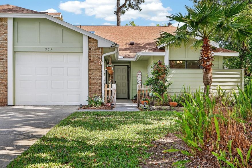 Welcome to your private retreat in the highly sought-after gated community of Pelican Bay! This beautifully positioned 3-bedroom, 2-bathroom home sits on a desirable corner lot and offers stunning lake and golf course views right from your backyard. Enjoy a low-maintenance lifestyle, as the HOA covers exterior maintenance and upkeep, giving you more time to relax and take in the serene surroundings. Whether you're sipping your morning coffee overlooking the water or entertaining guests, this home provides the perfect blend of comfort and scenery. Let time pass on the enclosed screen porch and enjoy evenings next to the woodburning fireplace. The spacious layout offers plenty of room for both everyday living and hosting. Major updates include a new A/C system and water heater (2021), offering added comfort and peace of mind. Don’t miss this rare opportunity to own a move-in-ready home in a secure, amenity-rich community with picturesque views and minimal upkeep just a short drive to the beach, shopping and the race track!