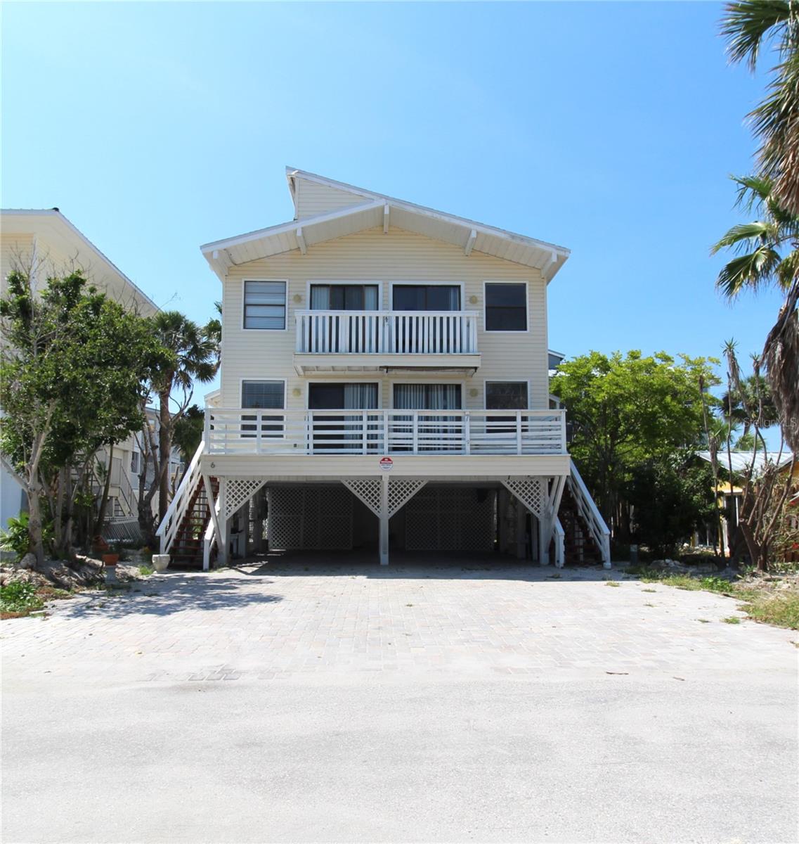 Apply within 24 hours of your conducted showing and once approved you will be credited your application fees towards your first full month's rent! You do not want to miss this perfect opportunity! This stunning 2-story duplex features 2-bedrooms, 1.5-bathrooms, plenty of natural lighting, and 2 balconies with the perfect beachfront views! The kitchen is ideal for any chef, featuring plenty of cabinet and counterspace for all, an eat in kitchen space, and all major appliances, including a refrigerator, microwave, dishwasher, and range. Complete with vinyl wood plank flooring throughout, neutral paint, and exposed beams, this home provides the perfect amount of cozy, beach vibes you have been searching for! The open concept living area provides plenty of space to entertain your guests, and leads out onto the open balcony, with views of the breathtaking beach access. A half bathroom completes this level of the duplex. Upstairs you will find two sizeable bedrooms and a shared bathroom, complete with a dual sink vanity for added storage, and a shower and tub combo. Laundry days will be a breeze with a washer and dryer located in the carport for your convenience. Pets okay, and no dangerous breeds.
This is the perfect location to call home! With plenty to do out on the water Lemon Bay is great for kayaking, paddleboarding, and dolphin sighting! Enjoy scenic trails and wildlife at Stump Pass Beach State Park or go into town and explore the charming and unique shops, entertainment, and live music on Dearborn Street. The options are endless! Call today for more information. Submit all applications to Ryntal Property Management ONLY!
Qualifications: We run a complete background check that includes credit, income verification, prior landlord and eviction history. In terms of credit, we look at the entire picture as opposed to just the credit score, but in general, we do require a score over 550.