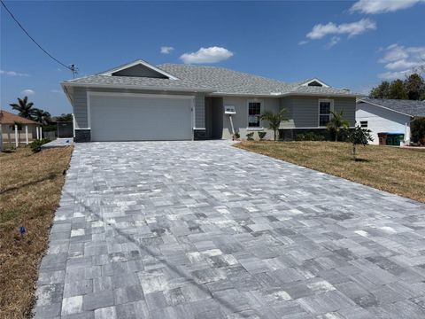 Photo of 2213 SE 15th Terrace, Cape Coral, FL 33990 (MLS # C7497081)