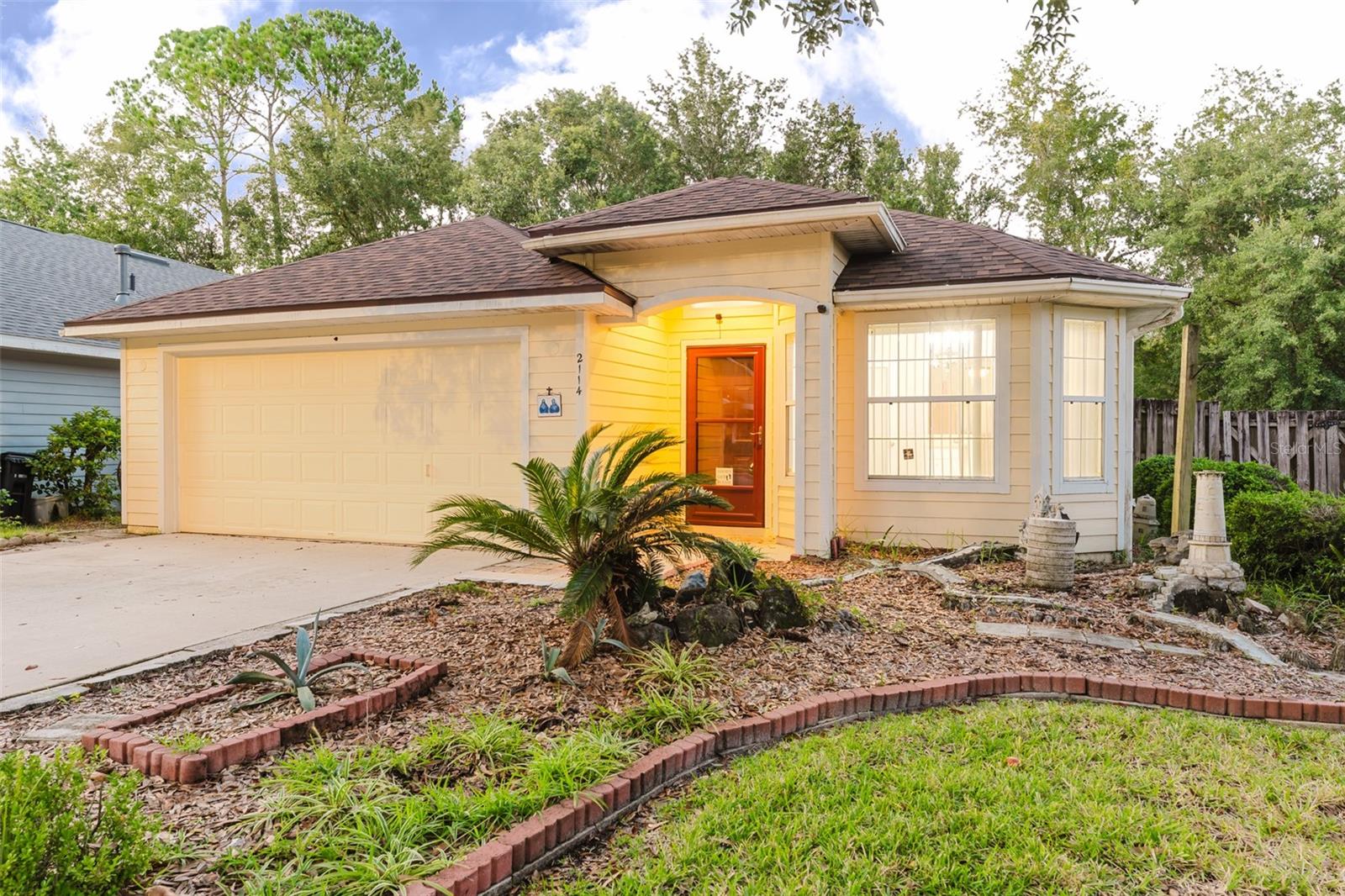 Step into this charming and cozy 3- bedroom 2-bath home tucked away in one of Gainesville’s most peaceful neighborhoods. This spacious home offers an open layout  filled with natural light from the beautiful bay window, creating the perfect space for family gatherings or quiet mornings with a cup of coffee. Outside, you’ll find a charming front yard with thoughtful landscaping and a private backyard ideal for pets to run, or evenings spent relaxing under the trees. A two-car garage with plenty of space for storage and everyday convenience. Located just minutes from local parks, top-rated schools, shopping, and the University of Florida, this home offers the perfect blend of comfort and convenience for any family. Enjoy access to a sparkling community pool, wellness center, tennis court, and family park. Everything you need for fun, relaxation, and connection close to home. Call today to schedule your private tour!