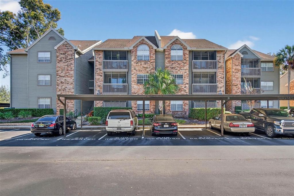 Photo of 2500 Winding Creek Boulevard #E203, Clearwater, FL 33761 (MLS # TB8471249)