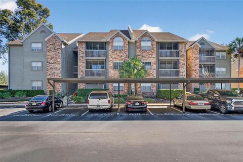 Photo of 2500 Winding Creek Boulevard #E203, Clearwater, FL 33761 (MLS # TB8471249)