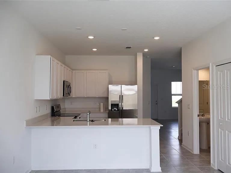 Photo of 2452 Skyline Loop, Kissimmee, FL 34758 (MLS # O6441842)