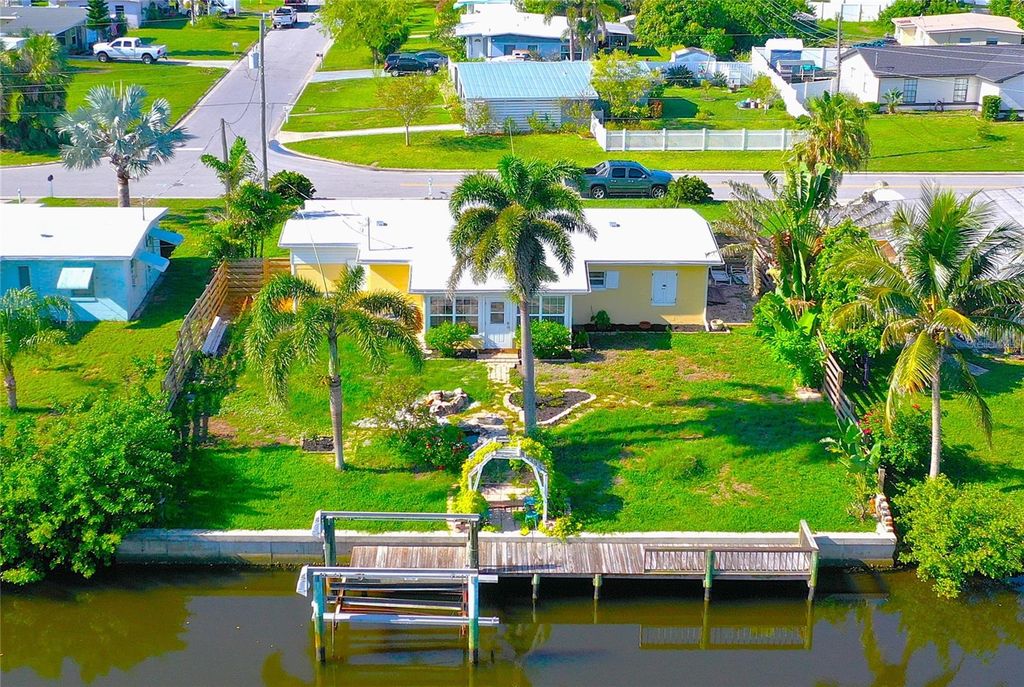 Photo of 119 Palmetto Circle, Port Charlotte, FL 33952 (MLS # C7513065)