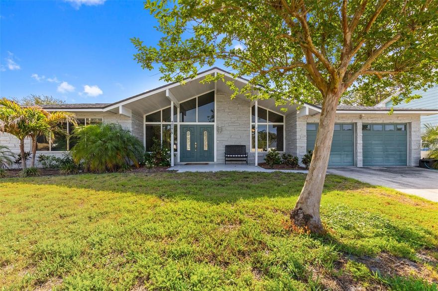 MULTIPLE OFFERS RECEIVED - PLEASE SUBMIT ALL OFFERS BY TUESDAY, MAY 12TH AT 11AM. Tucked into one of Seminole's most desirable neighborhoods, this one-of-a-kind mid-century modern pool home is ready for its next chapter! Set on just over a quarter acre this 4-bedroom, 3-bathroom pool home offers the space, style, and confidence today's buyers are looking for. The layout is thoughtfully designed for both everyday living and entertaining. A dramatic foyer opens on the right to a generous formal dining room with direct sight lines to the open living space. The oversized great room is the heart of the home, featuring cathedral ceilings and walls of sliding glass doors and windows that pour natural light in and lead directly to the pool deck for the ultimate Florida indoor-outdoor flow. A built-in bar with granite countertop and wine rack keeps the party going. The galley-style kitchen impresses with dark granite countertops, honey-toned shaker cabinetry, stainless steel appliances, and a pass-through breakfast bar that connects seamlessly to the living area. A separate bonus room at the front of the home is the perfect space for a home office, study, or playroom. The bedroom layout delivers true versatility: a private primary suite on one wing features an en-suite bath with an elongated granite vanity, separate water closet, and walk-in glass shower. Two additional bedrooms and a full bath round out that wing. On the opposite side of the home, a completely private guest suite with its own bath offers ideal separation for multi-generational living, long-term guests, or potential rental flexibility. The guest bath doubles as a pool bath with direct access to the backyard.
Step outside to your backyard retreat — a sparkling in-ground pool surrounded by a generous patio, all within a fully fenced and beautifully treed yard with room to roam. Additional highlights include an oversized 2-car garage and inside laundry with full-size Samsung washer and dryer. Most importantly, all the big-ticket systems have been addressed: roof (2024),  A/C (2025), and brand-new water heater(2026), giving buyers true peace of mind from day one. Seminole is one of Pinellas County's most sought-after communities, close enough to enjoy the Gulf's world-famous beaches and the vibrant dining and arts scene of downtown St. Pete, yet still in a quiet, established neighborhood that feels like home the moment you arrive. Outdoor lovers will enjoy Boca Ciega Millennium Park, Lake Seminole Park, and miles of trails perfect for kayaking, biking, and wildlife spotting. The best of Florida living is right outside your door!
