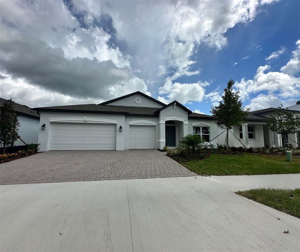Photo of 33139 SYCAMORE LEAF DRIVE, WESLEY CHAPEL, FL 33545 (MLS # J962850)