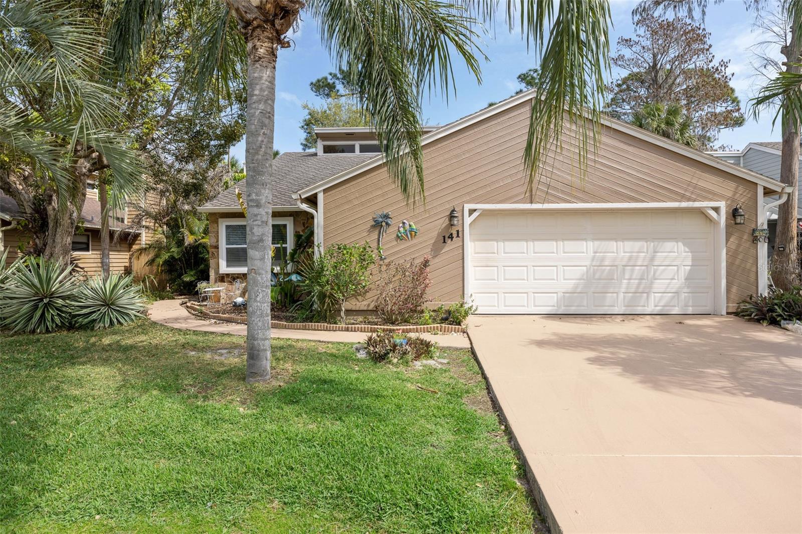 You will love this oversized master bedroom with a large sitting area. This is a beautiful, spacious two-bedroom villa with vaulted ceilings, real hardwood flooring, wood cabinets, granite countertops, updated bathrooms, and an oversized garage. Enjoy the peaceful park-like setting with golf course views in a beautiful, centrally located gated community. Close to beaches, shopping, restaurants, medical facilities, and other local attractions. Lawn care is included in the monthly association fee. This home is an excellent choice to enjoy the carefree Florida lifestyle. More photos available