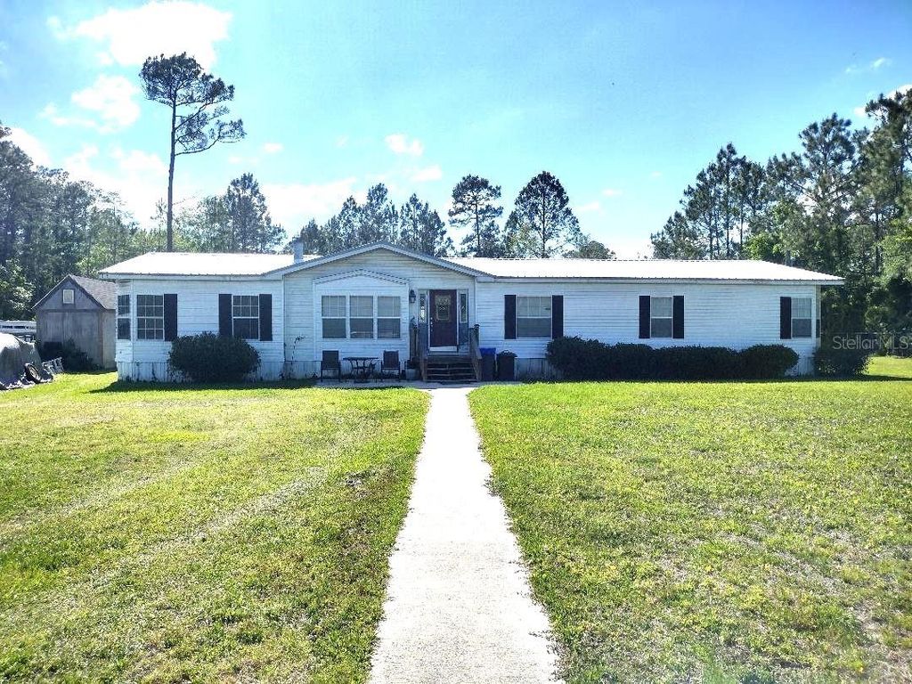 Photo of 1558 Candleberry Street, Bunnell, FL 32110 (MLS # FC318046)