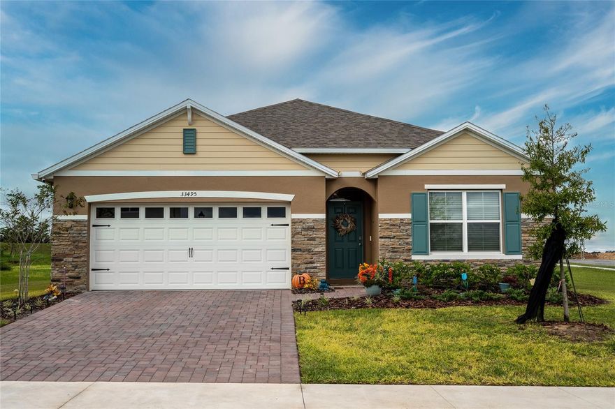 ***New-Build Vibes, Zero New-Build Hassle with “Already Did It For You” Upgrades*** 

Love the idea of “NEW,” but not the wait, dust, and punch-list déjà vu? Skip the hard hat—this move-in-ready Cali 4/2 (1,849 SF) sits on a premium corner lot with no rear neighbors (just greenspace and your peace)! Stone exterior draws you to this beautiful home along with thoughtful finishes for real life. Beautifully decorated open concept kitchen with island (stainless appliances included) flows to living/dining and the covered lanai—perfect for tacos on Tuesday and touchdowns on Sunday. Outside means PEACE and COFFEE on the lanai at sunrise and is officially on the calendar.! 
The split owner’s suite with ensuite and custom California-style walk-in closet, will be the envy of guests as your prized wardrobe is proudly displayed!
Upgrade Flex ($17,000 value—already in place) 
*Gutters – $4,000 
*California closets & cabinets (pantry, primary closet, laundry) – $5,000 
*Ceiling fans – $1,000 
*Garage storage racks – $1,000 
*Security cameras – $2,000 
*Washer & dryer – $2,000 
*Shower doors (both baths) – $2,000 
 Total  $17,000 (so yes, “over $15K” and then some). 

Community: pool, cabana, playground, sidewalks, dog-park areas, green spaces. 
No CDD | Near SR-46/429 (easy to Mount Dora, Apopka, Orlando) 
Publix 1 mile; East Lake Sports 2 miles; Rock Springs & Lake Dora nearby

Call today to schedule your viewing and experience this stunning, well-maintained home in person! Please note that all information and measurements are provided for accuracy but are not guaranteed to be accurate. Buyers and their agents should verify all property details, including zoning, schools, HOA rules, pet policies, and other potential uses.