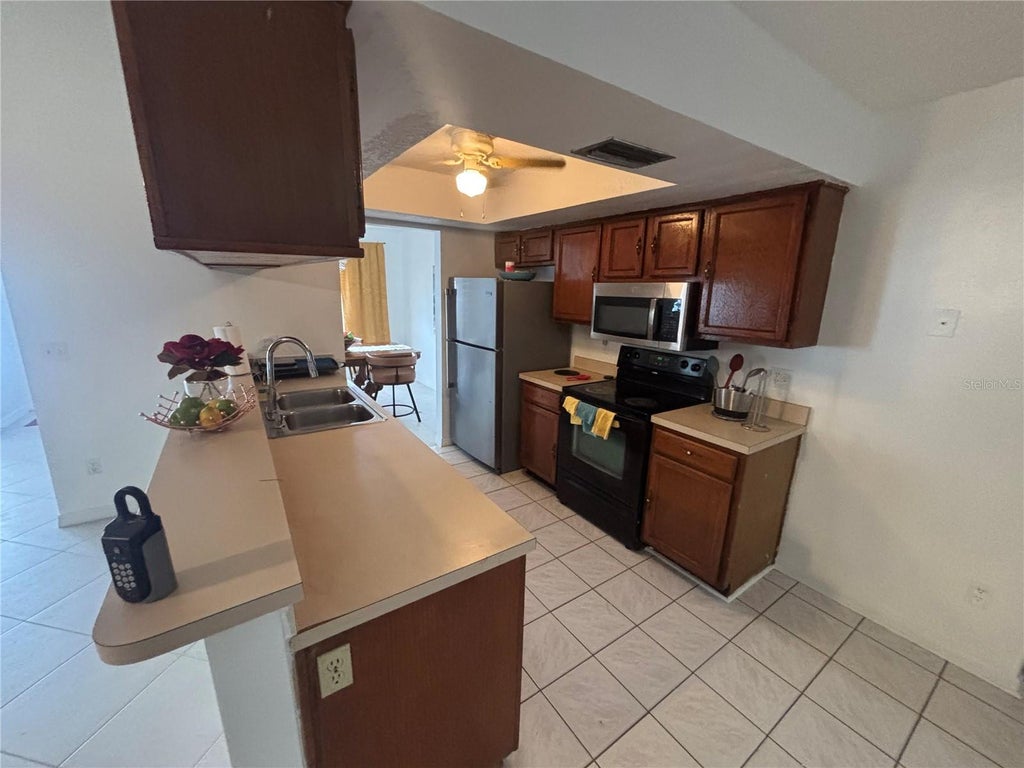 Photo of 7667 Havenford Court, Orlando, FL 32818 (MLS # O6445279)