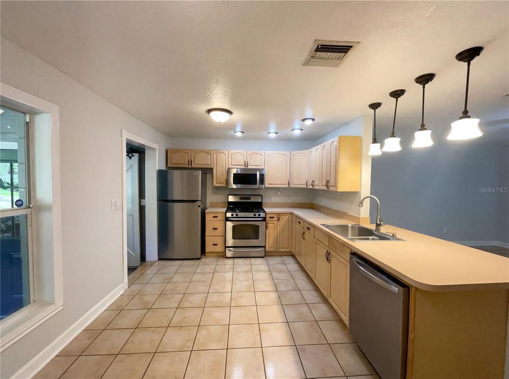 Photo of 2037 Recker Highway, Winter Haven, FL 33880 (MLS # O6377943)