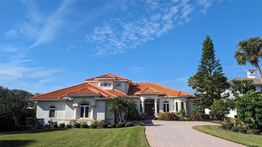 Paradise found! And waiting for you! Incredibly well thought-out open home direct ICW with dock to hold 70' boat, electric, water. A fisherman's dream with no bridge to the Inlet only about 1 mile north. Enjoy the sunsets over the river lounging in your elevated infinity-edge heated pool & spa. Entertain on the 57 feet of covered lanai with outdoor kitchen, seating for all guests & beautiful views of the lighthouse & downtown NSB. Chefs: this kitchen & entertaining areas are a dream! Double wall ovens: Advantium & convection, PLUS the GE Cafe gas range & oven. Enough ovens to bake that huge Thanksgiving dinner! Tons of solid wood cabinets for all the storage, plus more cabinets in the laundry. Enjoy the open floor plan from LR to DR, to 8'x9' bar area, to family room, kitchen, & really special half bath. 2 BRs & 2 BAs on the main floor for guests. One of these full baths opens to pool area and has steam shower. Don't miss the artist-painted mural on this wall! The main floor MBR ensuite is amazing! His & her closets, gorgeous bath with large his n her "walk around the corner" shower, his & her vanities, heated bidet toilet seat. The BR opens to the lanai right at the pool & spa. The office is just off the LR & MBR for easy access. Upstairs enjoy 2 master ensuites with private baths, sliders that open to second floor balcony overlooking pool, dock, river & town. These 2 suites enjoy their own cafe sitting area with full kitchen (no cooktop or range). They thought of everything to make their guests comfortable. Add to all this: whole house generator (natural gas), central vac, 3-1/2 car garage with lots of closets & workshop area. Sounds extraordinary? Now add professionally designed & decorated throughout. Short walk to the ocean, & all that Flagler Ave offers. Most of the designer furniture stays. Many unique aspects, too many to list. You just must see this special home! Room Feature: Linen Closet In Bath (Bedroom 5). Bedroom Closet Type: Walk-in Closet (Primary Bedroom).