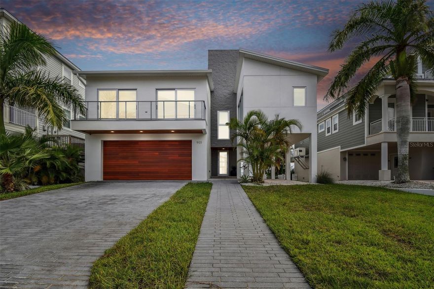 Move in ready newer construction home built on possibly some of the best protected water in the beaches of pinellas county so bring your 50+ foot yacht! Awesome open floor plan overlooking the water. 4 bedrooms, 4 baths, 4 car garage.  New pool south facing (if you know you know) in 2019 no expense spared, all jandy equipment including a pool heater. New dock and boat lift 16k lb with all the bells and whistles in 2019. High ceilings in the living room with exotic south american cumaru wood that adds just a touch of warmth and complexity. Amazing entrance with commercial glass doors and entry way. All the windows are pgt impact windows. The rooftop will amaze! over 1500 sq ft rooftop with open views of both sides to watch fireworks and boat parades. There is also a large covered patio downstairs with white cedar ceilings. This home is a statement piece- a work of art. For an additional amount the home can come fuly furnished.