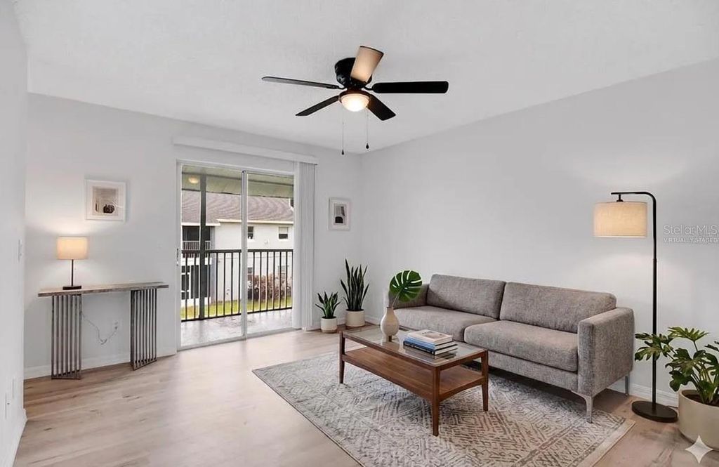 Photo of 4100 Pershing Pointe Place #3, Orlando, FL 32822 (MLS # O6411206)