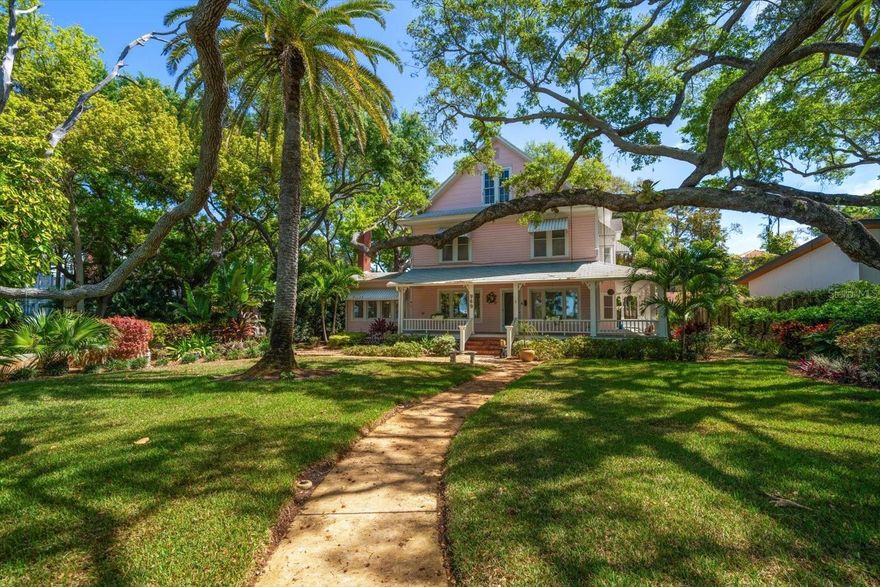 This spectacular house is located on beautiful, waterfront Victoria Drive in Dunedin, Florida!  A street where houses rarely become available to the market, this majestic turn of the century Victorian home overlooks the panoramic intercoastal waterway known as St. Joseph Sound. This is truly an idyllic setting situated on over an acre of prime waterfront property.  Majestic oak trees, a huge lushly landscaped front yard, and a private dock and boat lift are ready for your recreational pleasure. This stately home was built around 1900 and has been lovingly maintained by its owner for over 36 years.  It welcomes you with its inviting wrap-around porch, perfect for evening cocktails and sunset watching or reading a book and sipping lemonade on hot summer days. Step back in time, and inside you will find original gleaming heart of pine wood floors and beautiful crown moldings.  Entertain in the large dining area and relax in the adjoining parlor with its gas fireplace and original wood case windows that let in plenty of natural light. Off the dining area is a large island retro kitchen with a gas stove and Corian countertops. Downstairs feature a bedroom and a bedroom/office with a bathroom, and French doors that lead out to the wraparound porch. Leading upstairs is an oak banister stairway where you will find four more spacious bedrooms - all with carved door moldings, original crystal door knobs and classic baseboards. The second floor includes the master bedroom with whirlpool tub and lots of closet space, as well as 2 bedrooms that share a Jack-and-Jill bath. A laundry area with washer and dryer is also provided on this floor.  The 3rd floor is currently an attic area that can easily be converted to another bedroom or additional living space. The backyard is completely fenced and offers room for a pool. The spacious 2 car garage is detached. As an added bonus this home is withing walking or golf cart distance to Downtown Dunedin, awarded as one of the most walkable towns in America with its eclectic shops and restaurants, micro-breweries and many downtown activities. These activities include the Mardi Gras Celebration and Parade, Cinco de Mayo, Dunedin Wines the Blues, the Downtown Christmas Celebration and Boat Parade and many more.  The 28 mile bike trail is also accessible for walking, running, biking and skating.  This is a  fabulous opportunity to live in this one-of-a-kind waterfront location that has spectacular open water views and boating access to all of the area's best beach areas. It's a stone's throw to the pristine beaches of Caledesi Island, Honeymoon Island State Park, Sand Key and Clearwater Beach.  Plus there are numerous islands that dot the inter coastal waterway as well as 3 Rooker Bar and Anclote Key.  This is a fisherman's and beach lovers paradise! This home is a piece of Dunedin history located on historic, tree-lined Victoria Drive!  This gem is truly a rare find!