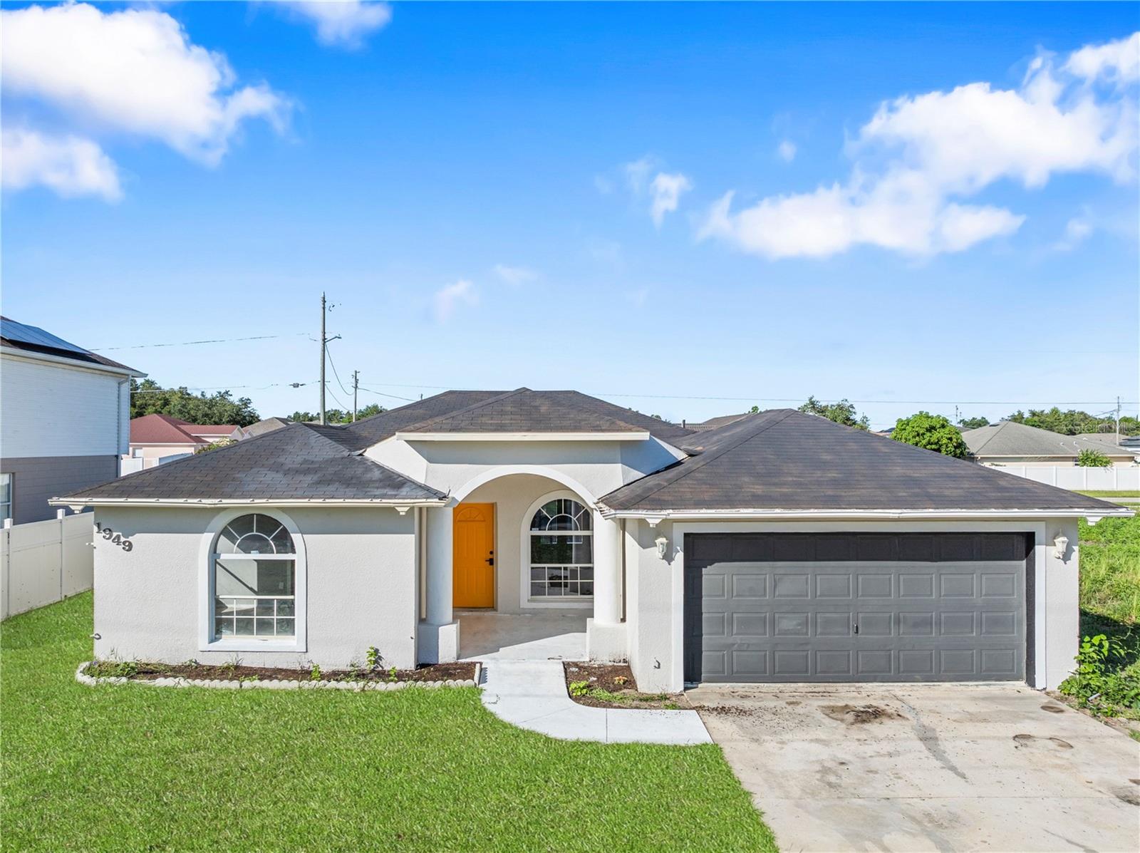 Welcome to 1949 Manatee Court, a charming and move-in ready 4-bedroom, 2-bath single-family home nestled in the heart of Kissimmee. This beautifully maintained property offers a spacious open-concept layout, bathed in natural light, ideal for first-time buyers, growing families, or savvy investors.
Inside, you’ll find wood-look ceramic tile flooring, freshly painted interiors, and vaulted ceilings that create an airy, expansive feel. The remodeled kitchen is the centerpiece of the home, featuring sleek white cabinetry, stainless steel appliances, and a cozy eat-in dining space that flows effortlessly into both the main living and family rooms—perfect for hosting friends and family.
Step outside to your private backyard patio, a great space for weekend BBQs, morning coffee, or simply unwinding in the Florida sunshine. The home also includes a 2-car garage, a welcoming front porch, and standout curb appeal.
As a resident, you’ll enjoy access to a host of resort-style amenities included in the monthly HOA fee—multiple pools, a playground, a fitness center, and even cable and internet service. These added perks enhance your lifestyle while keeping costs streamlined.
Conveniently located just minutes from Poinciana’s shopping centers, schools, medical facilities, and major roads, this home offers a perfect balance of privacy and accessibility. Whether relaxing indoors or enjoying the community’s features, 1949 Manatee Court delivers the best of Florida living.