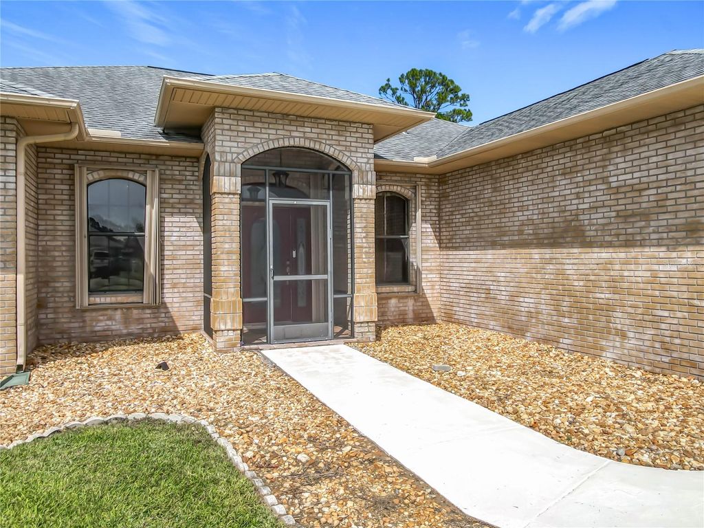 Photo of 2741 Turnbull Estates Dr, New Smyrna Beach, FL 32168 (MLS # NS1086270)