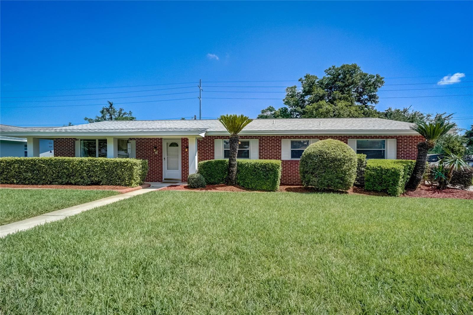 Beautifully Maintained Pool Home! Roof & Water Heater updated within the last 2 years!! A/C 5 years!!! Most every part of this well-loved home has been updated by the current long-term owners: repipe, electrical panel, remodeled bathrooms/kitchen, and more! Inside, the layout of this spacious 4 bedroom, 2.5 bath house is thoughtfully designed, with pocket doors that compartmentalize many areas, allowing for your choice of gathering together or taking a few quiet moments to yourself. Find relaxation in front of the wood-burning fireplace or unwind at the private pool under Florida’s sun and night sky. Outdoors, the curb appeal shines as the garage is hidden in the back. The driveway conveniently wraps around the home and pool, ensuring plenty of parking and easy access to the rear-loading garage. This centrally located property is tucked away less than a mile to Lake Orienta public boat ramp, and approximately 2 miles to all the events, recreation, shopping & restaurants of the Cranes Roost Park area. An I-4 interchange is equally nearby to start your journey as you explore everything else the sunshine state has to offer. This is Florida living!