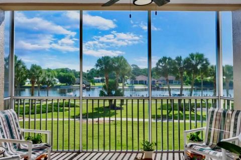 Photo of 800 Canopy Walk Lane #822, Palm Coast, FL 32137 (MLS # O6289858)
