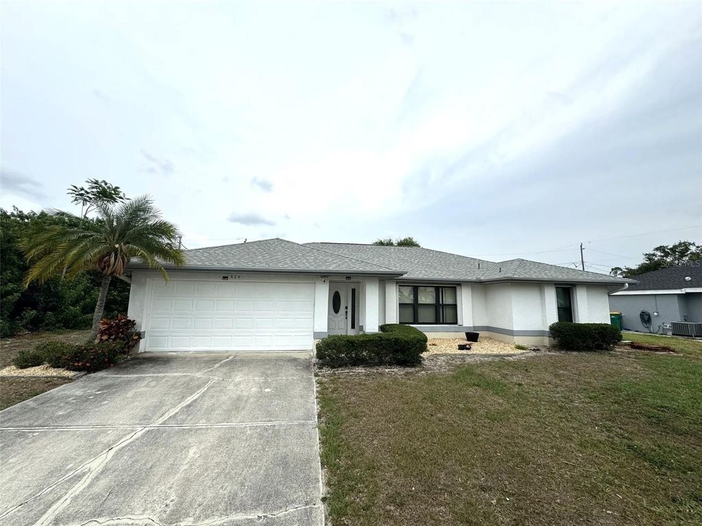 Photo of 424 Delaney Street, Port Charlotte, FL 33954 (MLS # C7517919)
