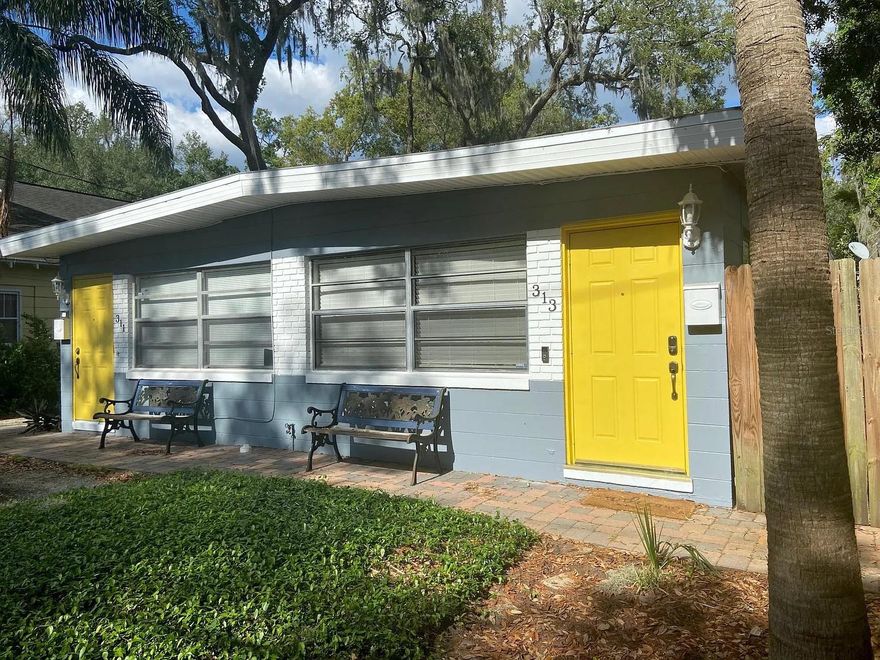 Located in the heart of downtown Orlando, this well-maintained duplex at 313 S Lawsona Blvd offers flexibility for a variety of living arrangements. Each side features 2 bedrooms and 1 bathroom with separate private entrances, providing privacy and convenience. The left unit has been fully renovated, while the right unit features fresh paint and new baseboards—making both spaces move-in ready. The property has seen several key updates, including newer HVAC systems (2022/2023), updated electrical panels (2019), water heaters (2020/2021), and a roof replaced in 2015. A shared washer and dryer are located in the rear building, which also offers approximately 400 sq ft of additional storage space. The detached structure provides potential for future use, subject to buyer verification. Situated on a generously sized lot, the home features a large fenced backyard and side yard—ideal for enjoying outdoor space and added privacy. Located in the highly sought-after Thornton Park neighborhood, just a short walk to Lake Eola Park, this property is surrounded primarily by single-family homes, enhancing its charm and appeal. Conveniently close to downtown Orlando, dining, entertainment, and major roadways, this property offers a unique opportunity to own a versatile home in one of the city’s most desirable central locations.