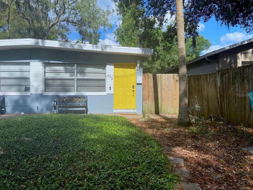 Located in the heart of downtown Orlando, this well-maintained duplex at 313 S Lawsona Blvd offers flexibility for a variety of living arrangements. Each side features 2 bedrooms and 1 bathroom with separate private entrances, providing privacy and convenience. The left unit has been fully renovated, while the right unit features fresh paint and new baseboards—making both spaces move-in ready. The property has seen several key updates, including newer HVAC systems (2022/2023), updated electrical panels (2019), water heaters (2020/2021), and a roof replaced in 2015. A shared washer and dryer are located in the rear building, which also offers approximately 400 sq ft of additional storage space. The detached structure provides potential for future use, subject to buyer verification. Situated on a generously sized lot, the home features a large fenced backyard and side yard—ideal for enjoying outdoor space and added privacy. Located in the highly sought-after Thornton Park neighborhood, just a short walk to Lake Eola Park, this property is surrounded primarily by single-family homes, enhancing its charm and appeal. Conveniently close to downtown Orlando, dining, entertainment, and major roadways, this property offers a unique opportunity to own a versatile home in one of the city’s most desirable central locations.