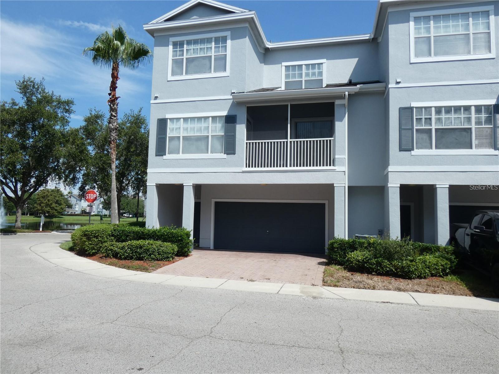 Enjoy the peace and serenity of beautiful water views from the comfort of your home! This lovely 3/2 move-in ready corner unit in The Estates at Park Central is a rare find. The property features a light, bright and open floorplan with tile and laminate throughout -- no carpet--for ease of care and maintenance. Newer appliances in place, and freshly painted on the interior, this home has been well maintained and cared for by its owner. This tri-level property features a huge, 2-car garage on the ground level, a spacious living/dining room combo on the 2nd (main) level with kitchen and owner’s suite with full bath, and 2 generously sized secondary rooms on the 3rd level, each with its own walk-in closet, and a hall bath. The community offers a host of amenities for residents' enjoyment, including a community pool, fitness center, clubhouse, playground and recreational facilities to name a few. Residents now enjoy Spectrum's ultra-fast 1GB high-speed internet for just $30/month, a recent service added to the community. Conveniently located within minutes of I-4, SR 408, Millenia Mall, downtown Orlando, Winter Garden, area shopping and dining, this community and property offers both convenience and comfort. Don't miss the opportunity to call this your "home sweet home"!